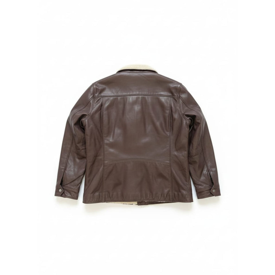 Flat lay of Noayle Pro leather jacket highlighting zipper details and cuff buttons.